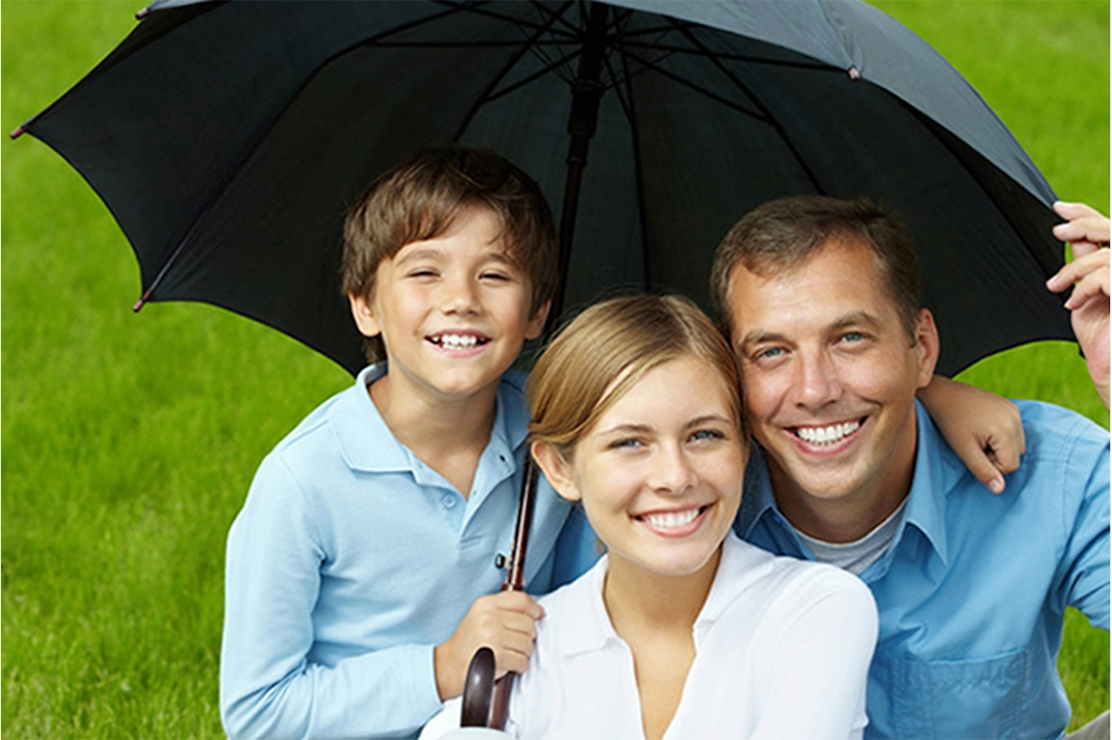 personal-umbrella-insurance- family in an umbrella
